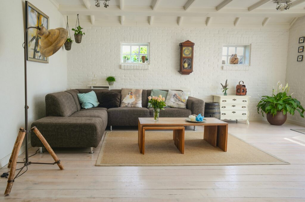 living-room-couch-interior-room-584399-584399 Stylish living room interior featuring a cozy couch, decor accents, and natural elements.